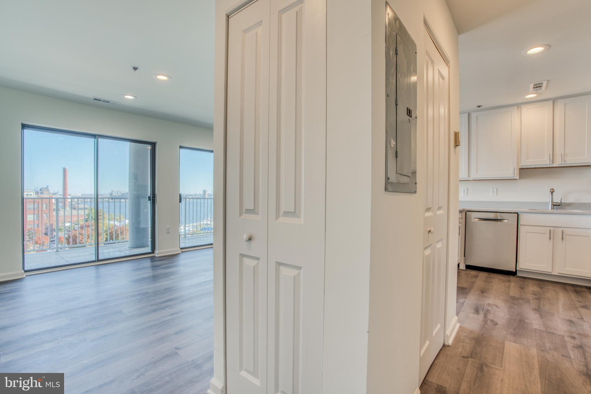 2702 Lighthouse Point East, Unit 626 Baltimore, MD 21224 - Photo 59 of 60 Open floor plan with combo living/dining room