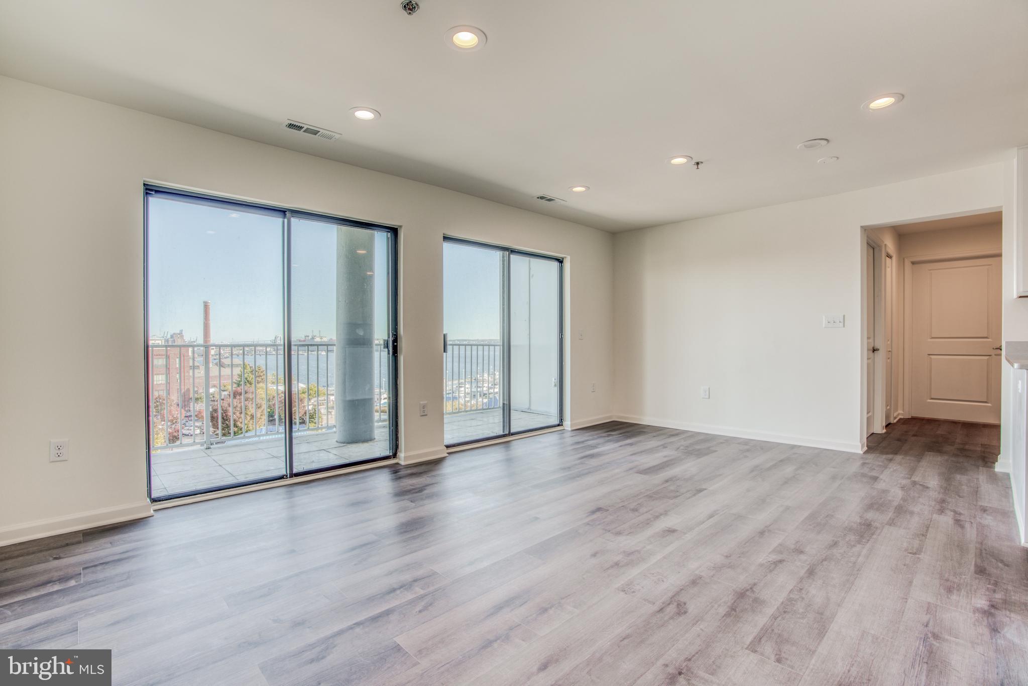 2702 Lighthouse Point East, Unit 626 Baltimore, MD 21224 - Photo 3 of 60 Gorgeous water views from living room and balcony
