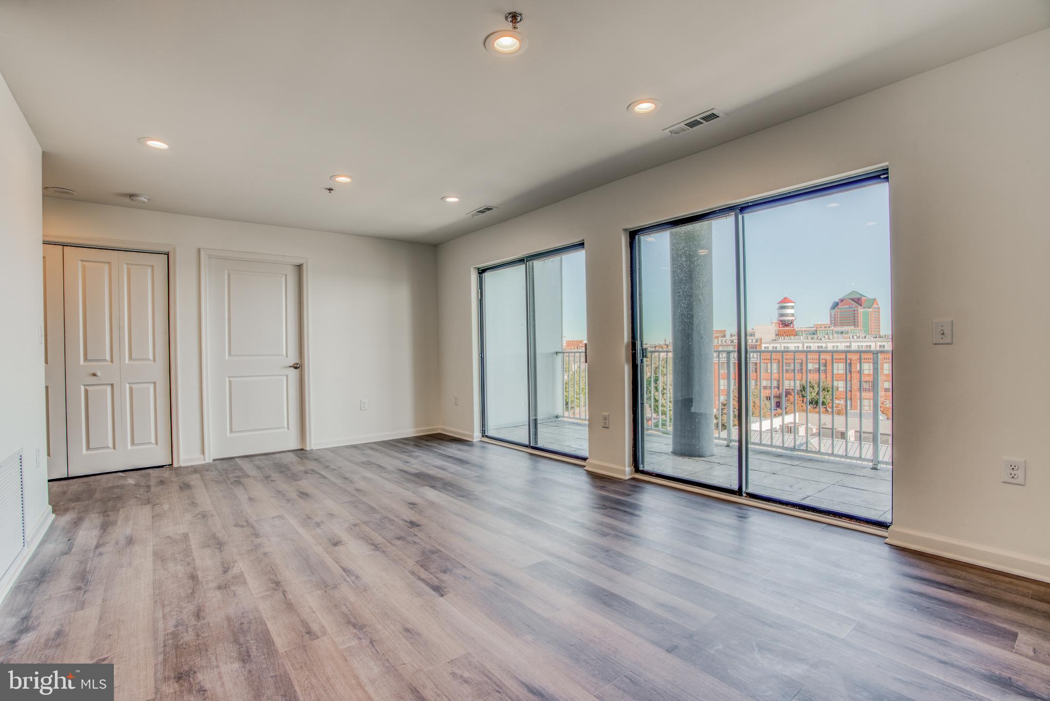 2702 Lighthouse Point East, Unit 626 Baltimore, MD 21224 - Photo 18 of 60 Balcony off the living room!