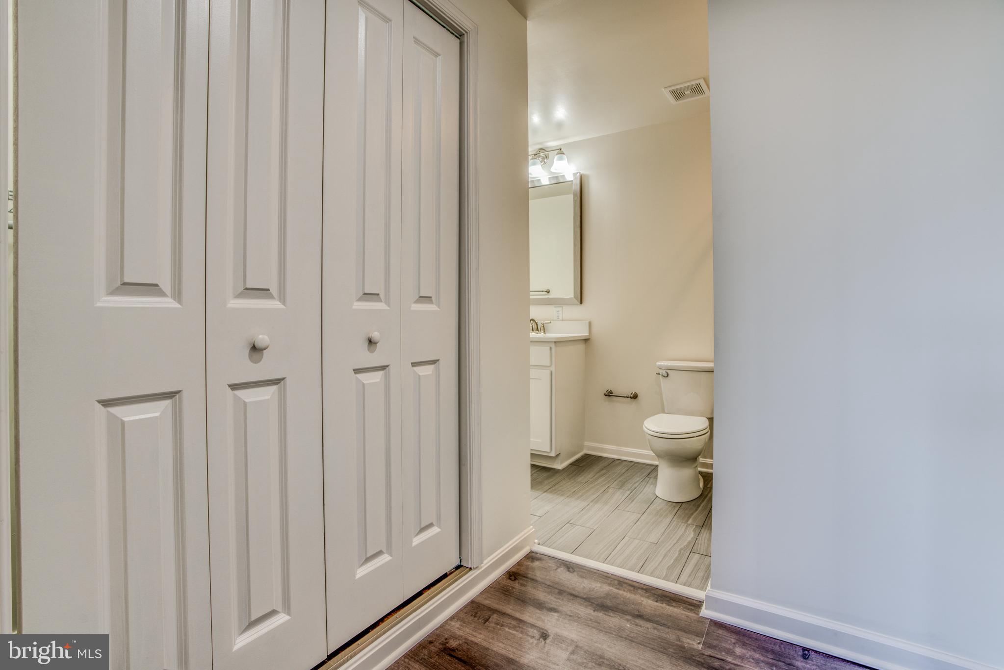 2702 Lighthouse Point East, Unit 626 Baltimore, MD 21224 - Photo 26 of 60 Closet and primary bathroom