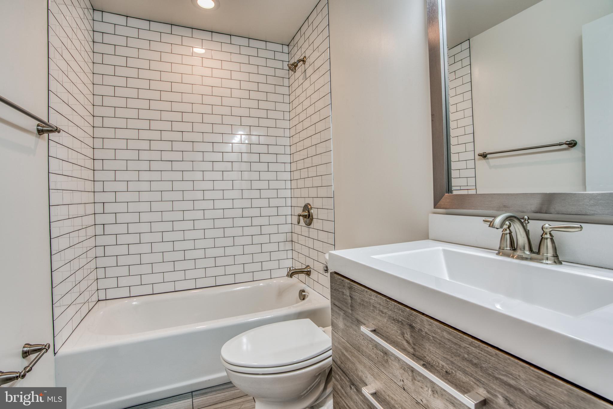 2702 Lighthouse Point East, Unit 626 Baltimore, MD 21224 - Photo 41 of 60 Updated second full bathroom