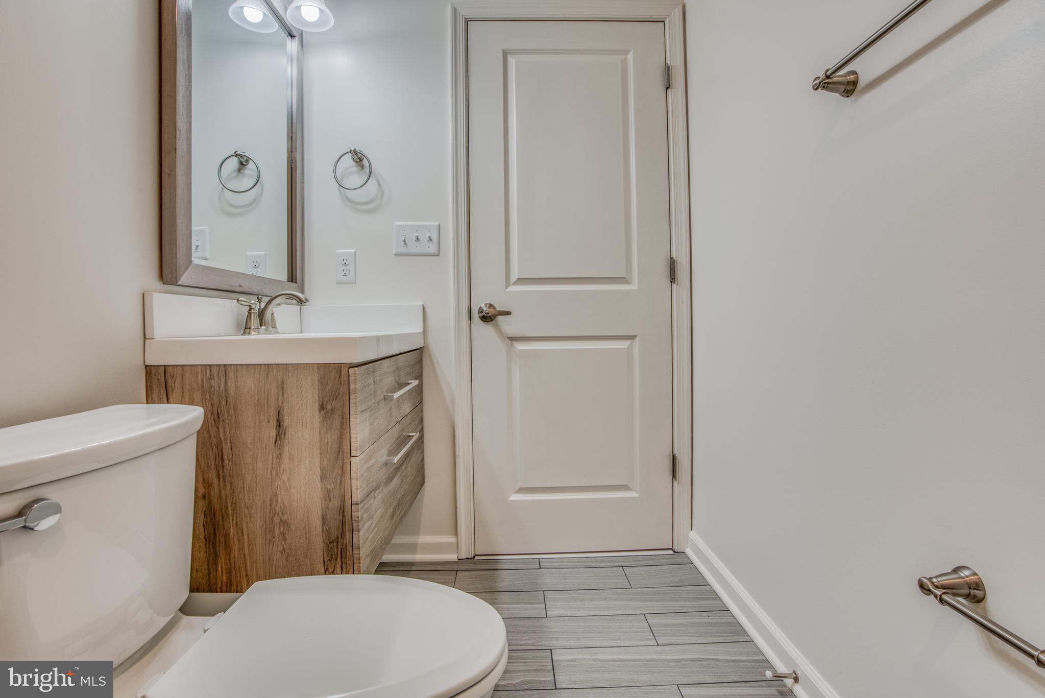 2702 Lighthouse Point East, Unit 626 Baltimore, MD 21224 - Photo 45 of 60 Updated second full bathroom