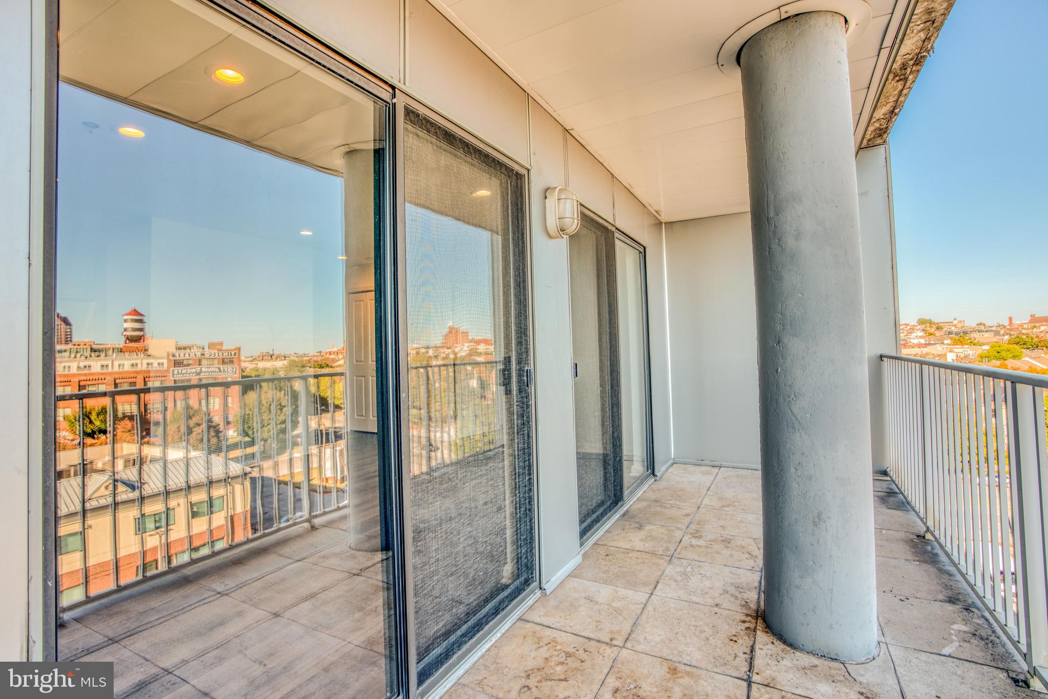 2702 Lighthouse Point East, Unit 626 Baltimore, MD 21224 - Photo 48 of 60 Balcony with city and water views
