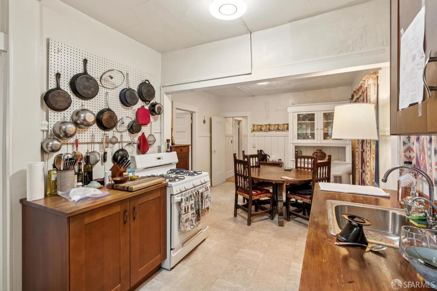 2732 Parker Street Berkeley, CA 94704 - Photo 13 of 25 a view of a workspace with furniture and a fireplace