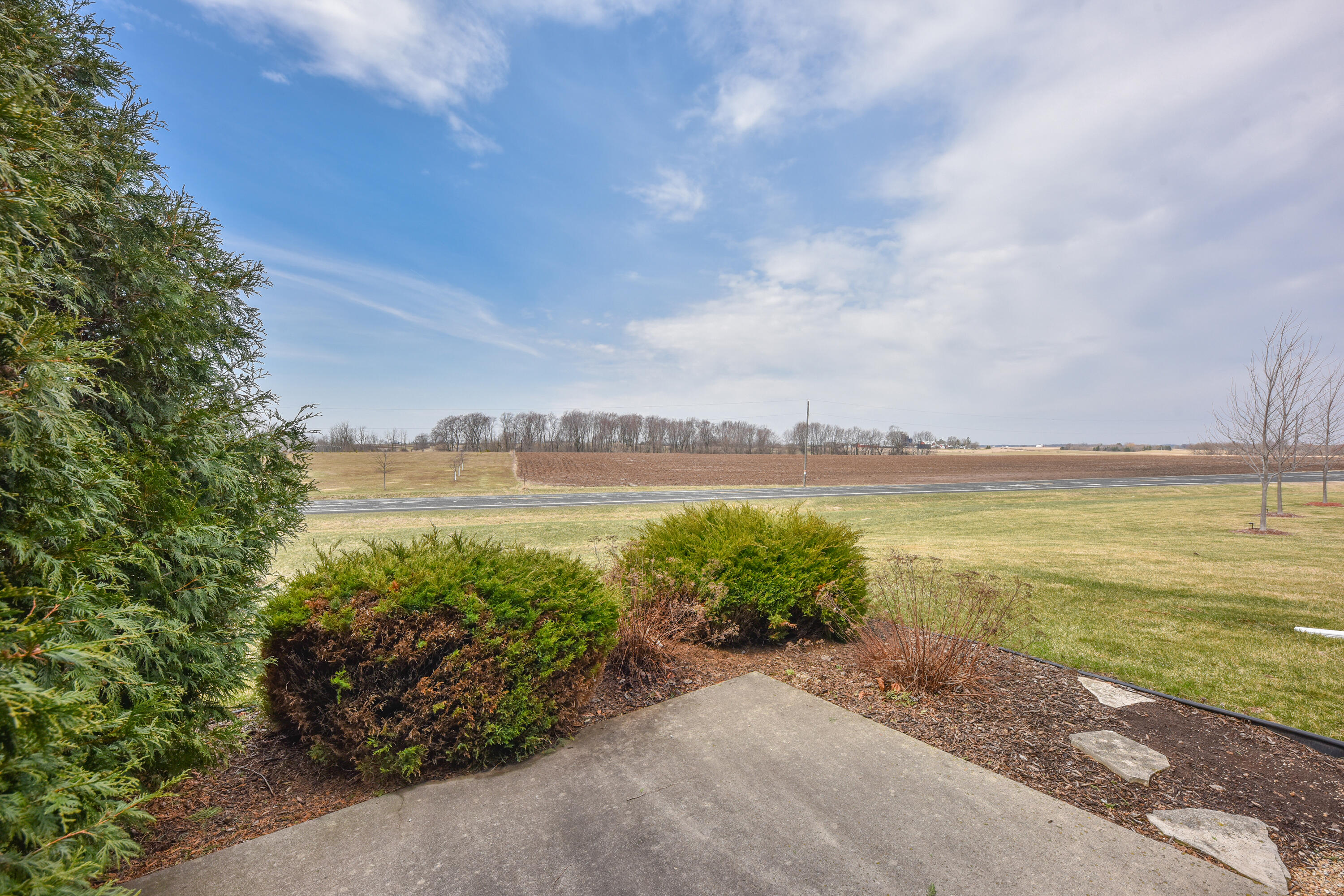 309 La Roche Lane Belgium, WI 53004 - Photo 30 of 32 Back patio (facing west)
