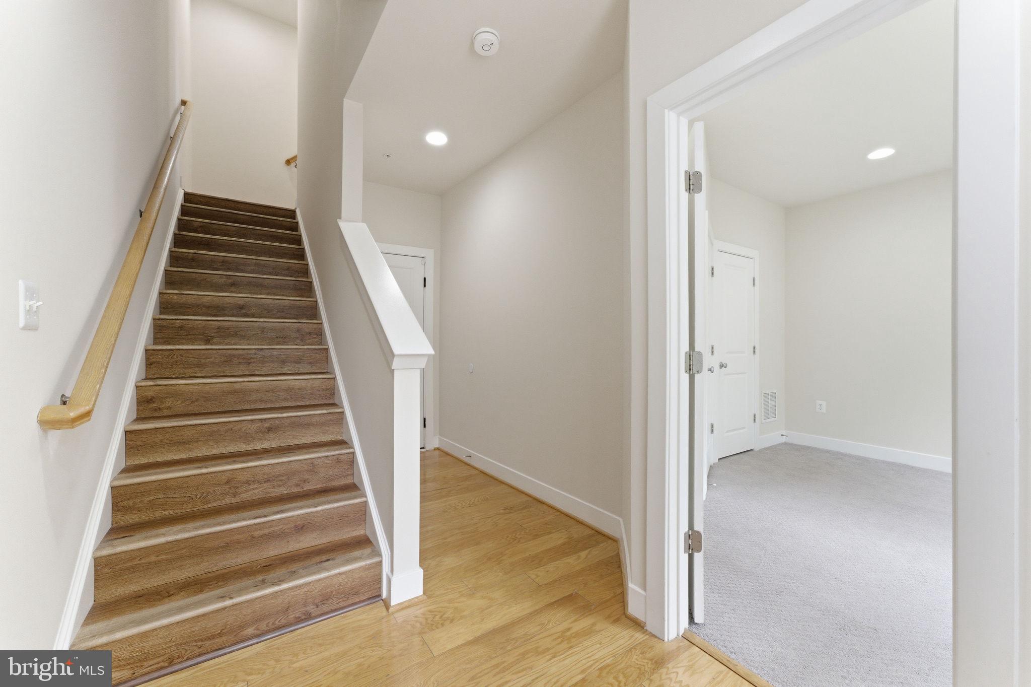 169 Kandinsky Loop Silver Spring, MD 20906 - Photo 7 of 67 Inviting entryway with staircase charm.