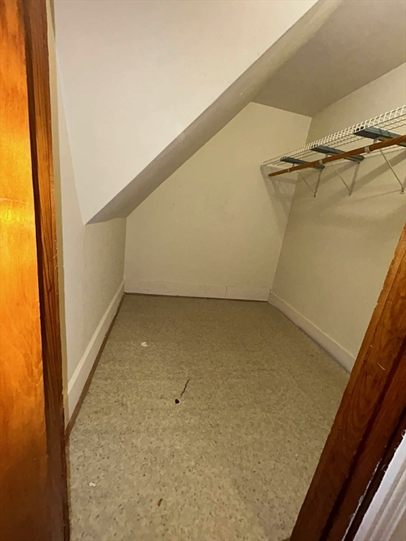 58 Tower Street, Unit 3 Worcester, MA 01606 - Photo 9 of 11 a view of a room with racks on the wall