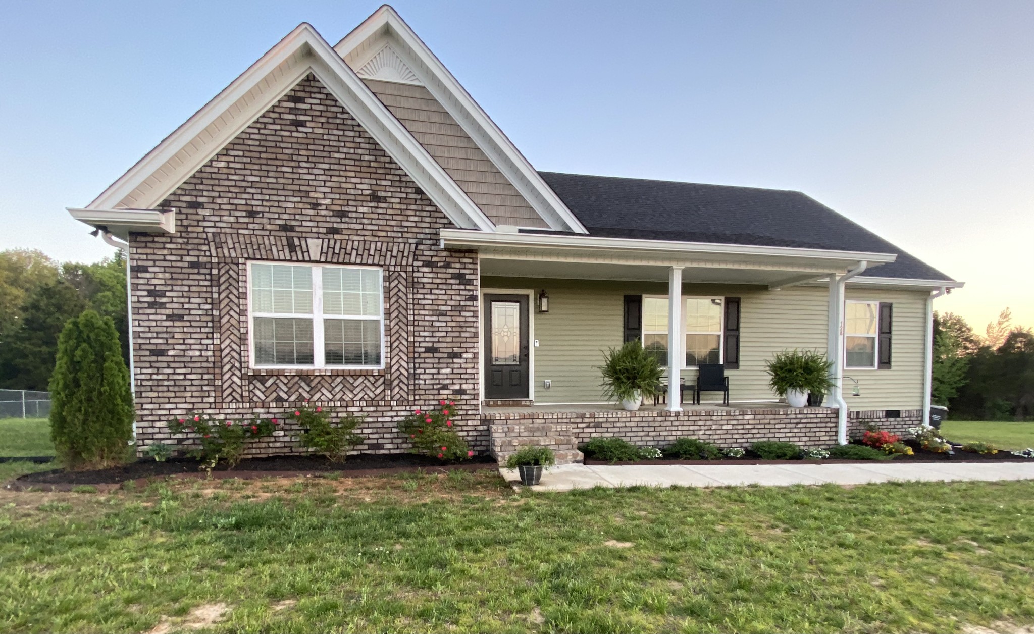 128 East Carter Road Portland, TN 37148 - Photo 1 of 26 front view of a house with a yard