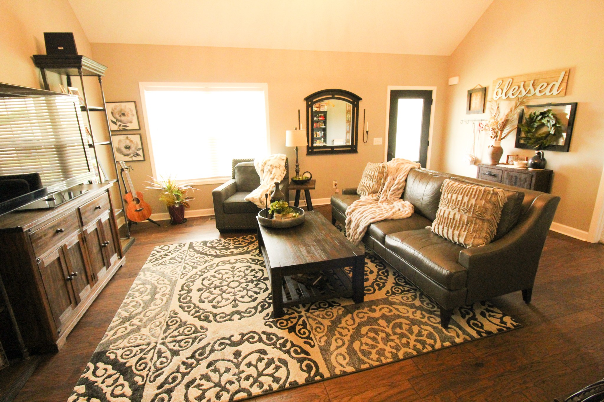 128 East Carter Road Portland, TN 37148 - Photo 14 of 26 a living room with furniture fireplace and a flat screen tv