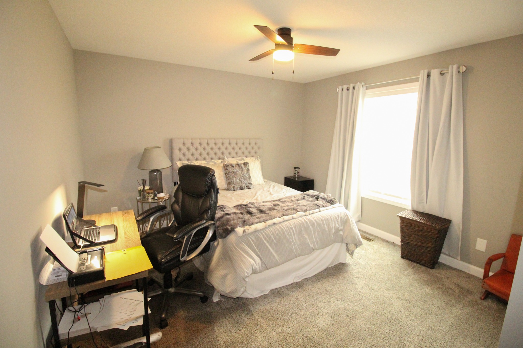 128 East Carter Road Portland, TN 37148 - Photo 16 of 26 a bedroom with a bed and a window