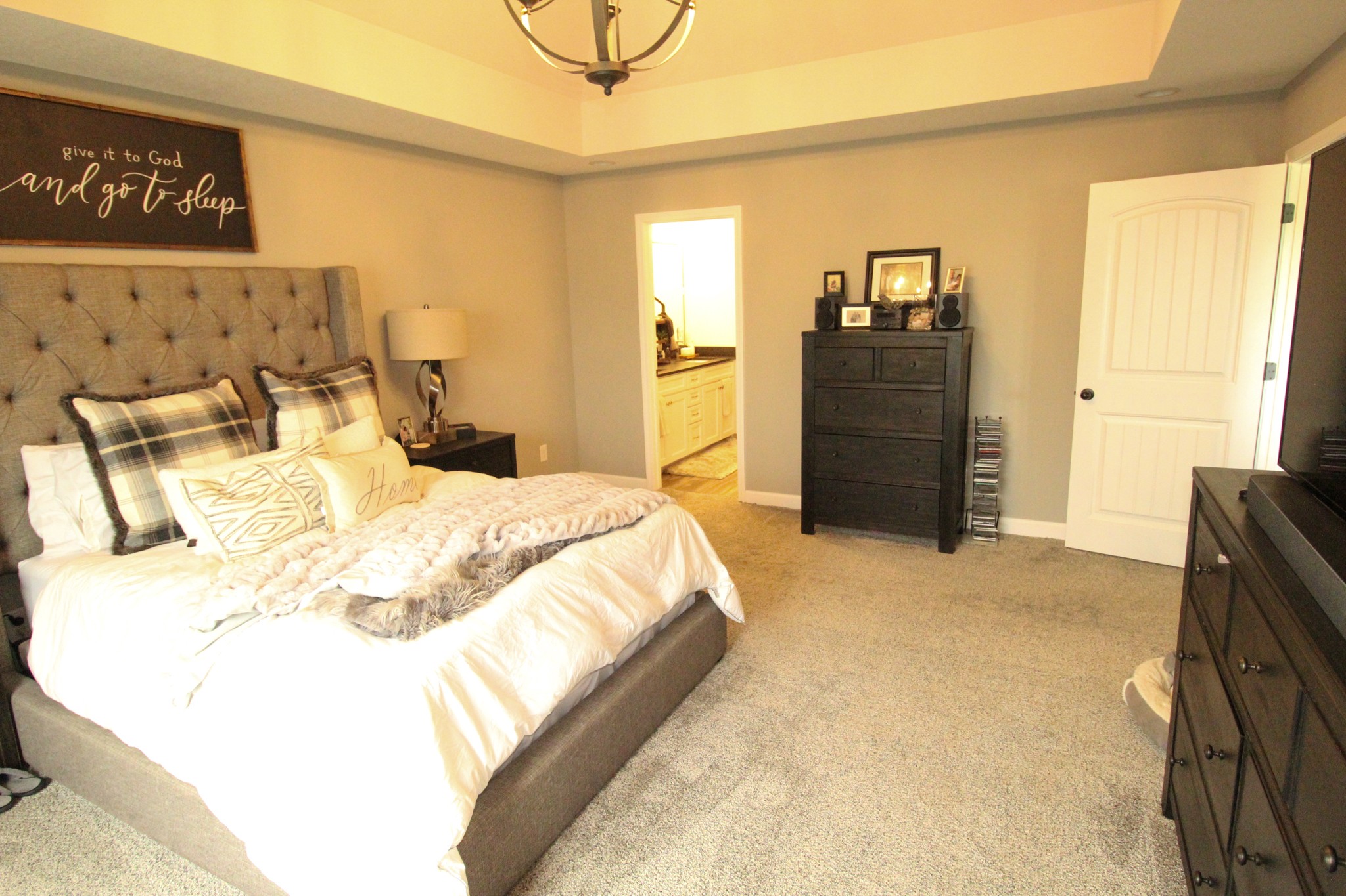 128 East Carter Road Portland, TN 37148 - Photo 18 of 26 a bedroom with a bed and dresser