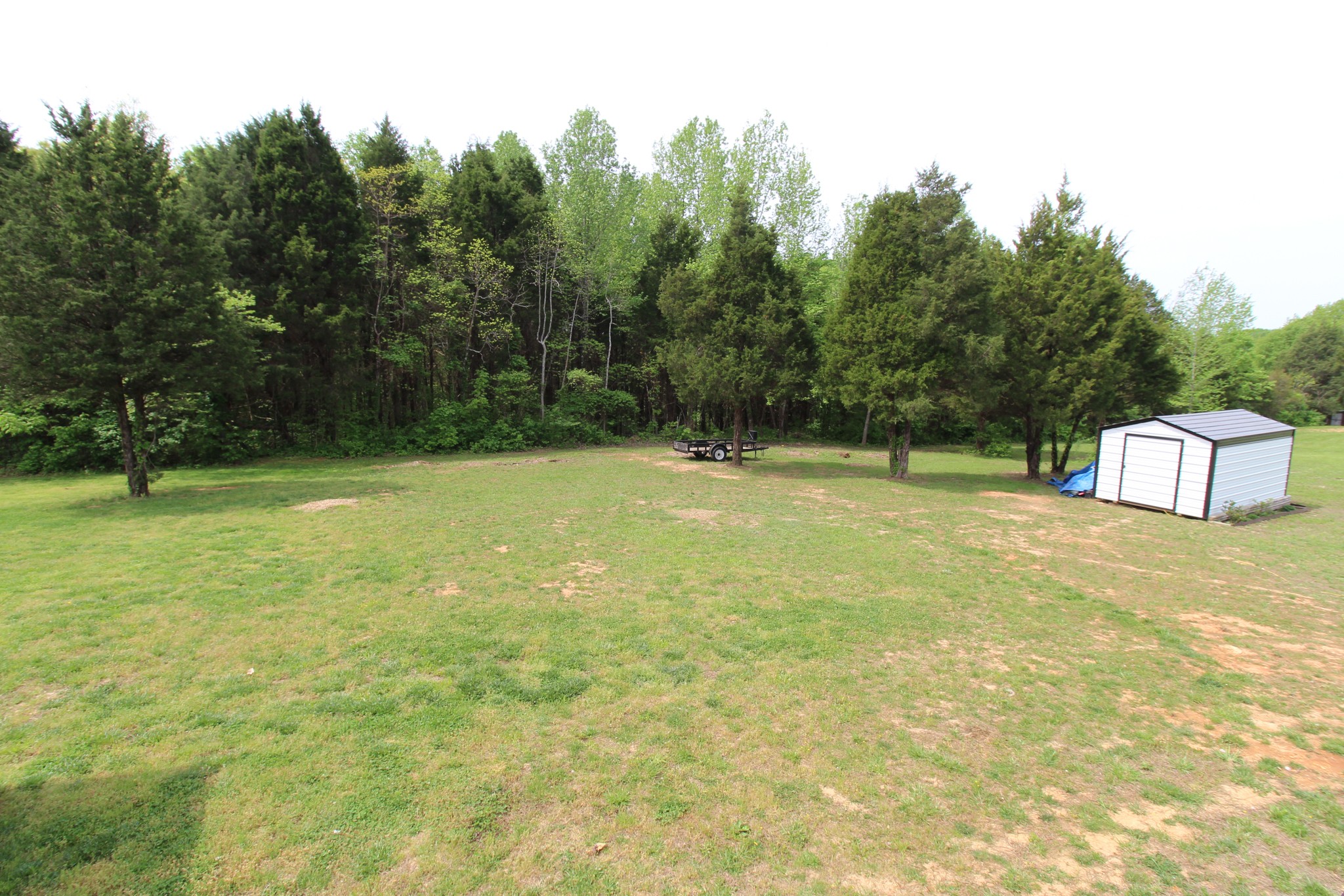 128 East Carter Road Portland, TN 37148 - Photo 25 of 26 a view of an outdoor space and a yard