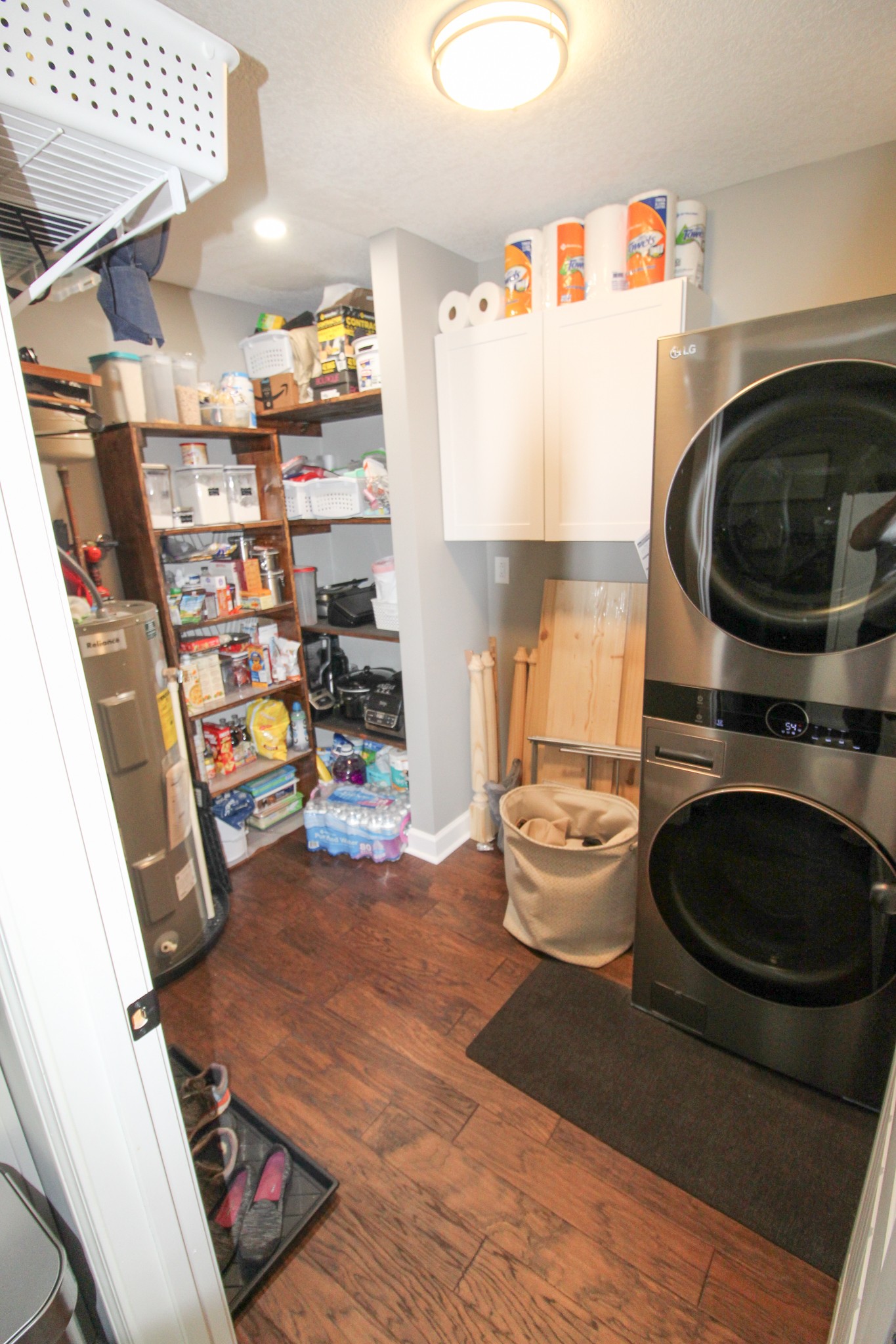 128 East Carter Road Portland, TN 37148 - Photo 3 of 26 a kitchen with a refrigerator and a stove top oven