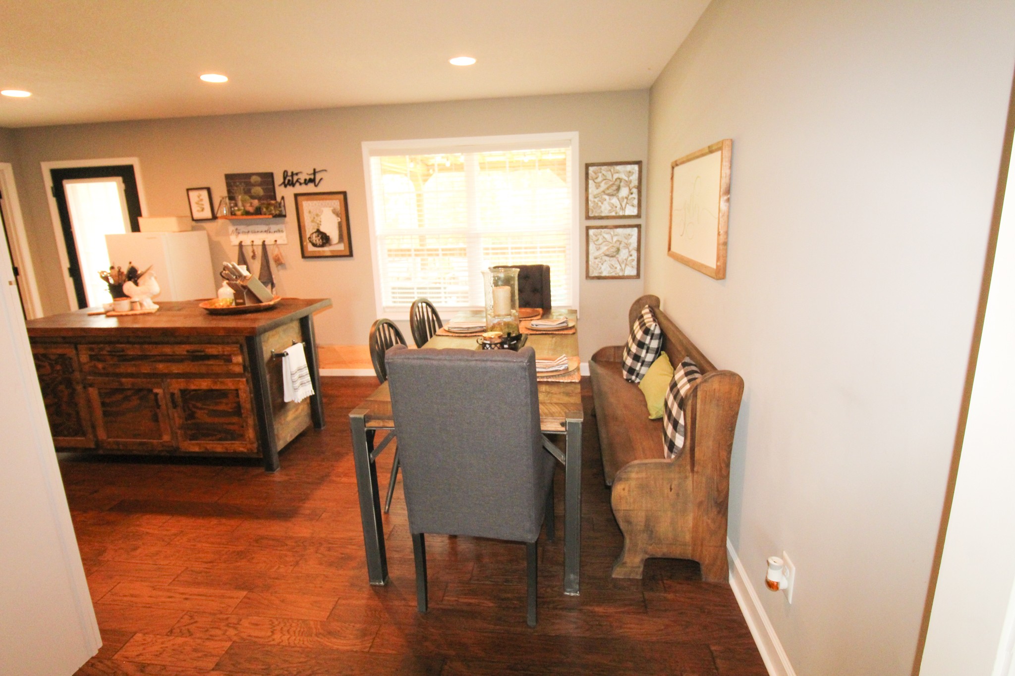 128 East Carter Road Portland, TN 37148 - Photo 10 of 26 a view of a dining room with furniture window and wooden floor