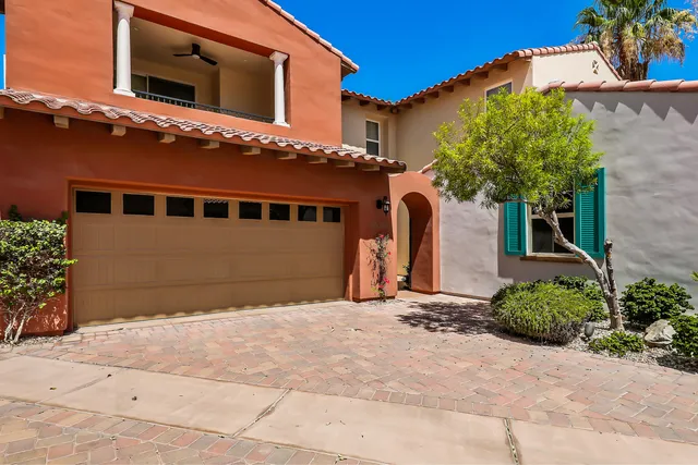 a view of a house with a garage