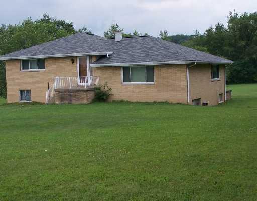 151 Sarver Road Sarver, PA 16055 - Photo 1 of 6 Exterior Front. 3 Bedroom brick Multi-Level on 2.70 level acres. 2 car Integral garage.