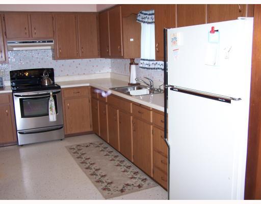 151 Sarver Road Sarver, PA 16055 - Photo 5 of 6 Kitchen. 11x12 L-Shaped Eat-in kitchen. Includes newer stainless steel electric stove and refrigerator.