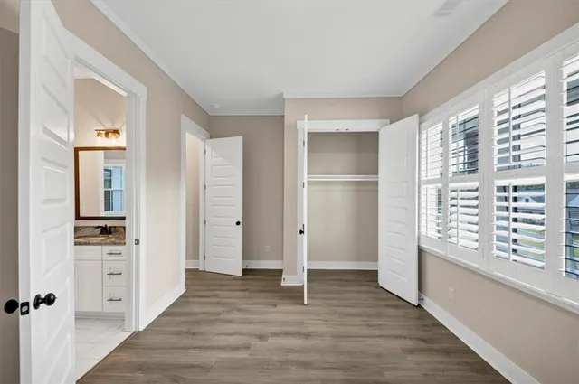 a bathroom with a bathtub and toilet