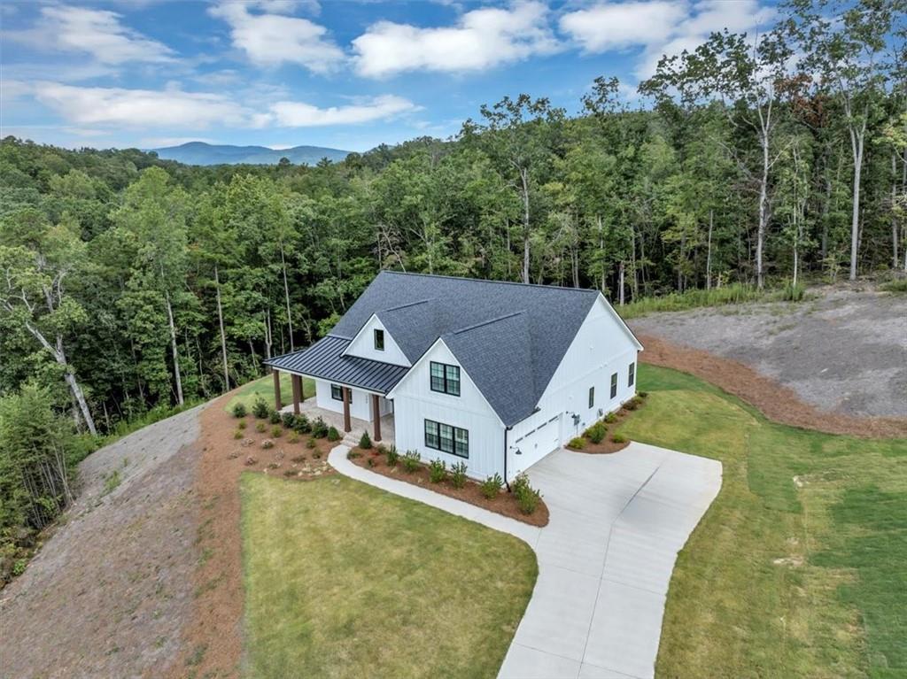 388 Oxford Road Ball Ground, GA 30107 - Photo 51 of 55 an aerial view of a house