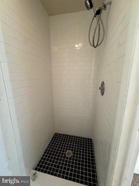 3621 Seaford Court Pasadena, MD 21122 - Photo 13 of 25 a bathroom with a shower