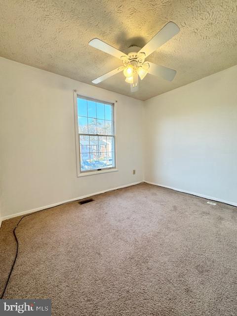 3621 Seaford Court Pasadena, MD 21122 - Photo 14 of 25 an empty room with windows and fan