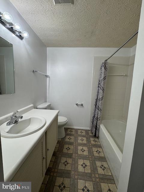 3621 Seaford Court Pasadena, MD 21122 - Photo 16 of 25 a bathroom with a sink a toilet a mirror and shower