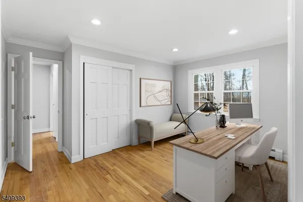 a living room with a table and a window