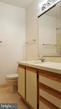 a view of hallway with wooden floor