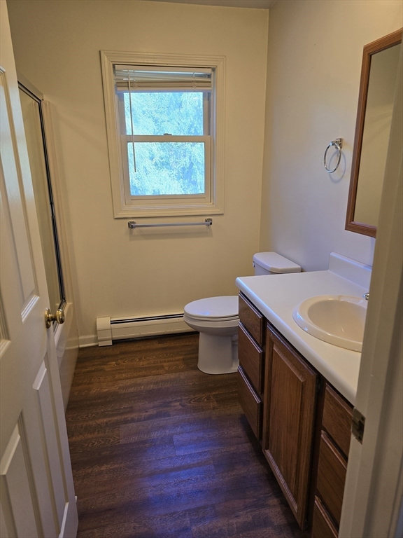 146 Old Amherst Road Sunderland, MA 01375 - Photo 11 of 16 a bathroom with a sink a toilet a mirror and shower