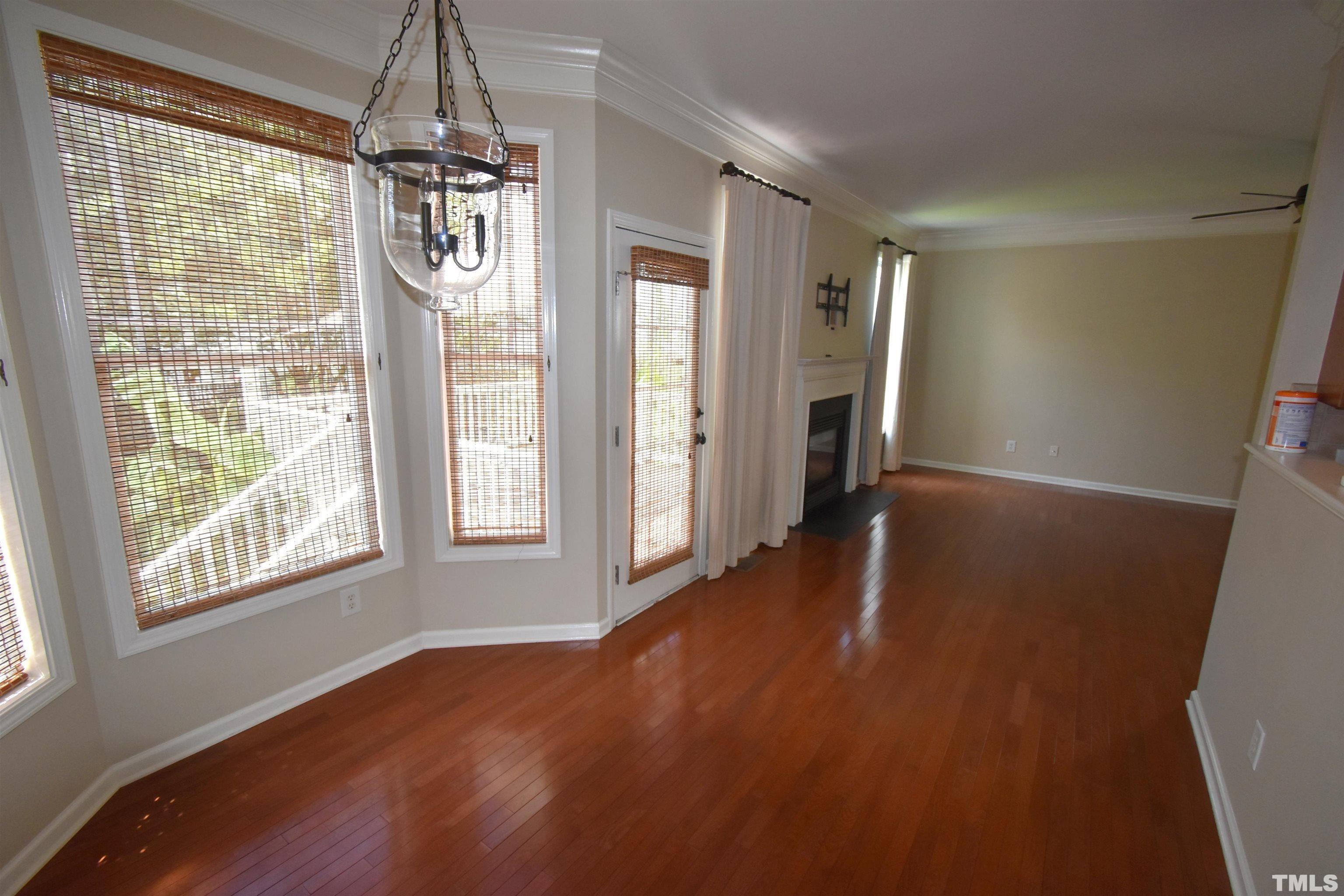 2019 Sinclair Trace Burlington, NC 27215 - Photo 11 of 32 a very nice looking room with wooden floor and a window