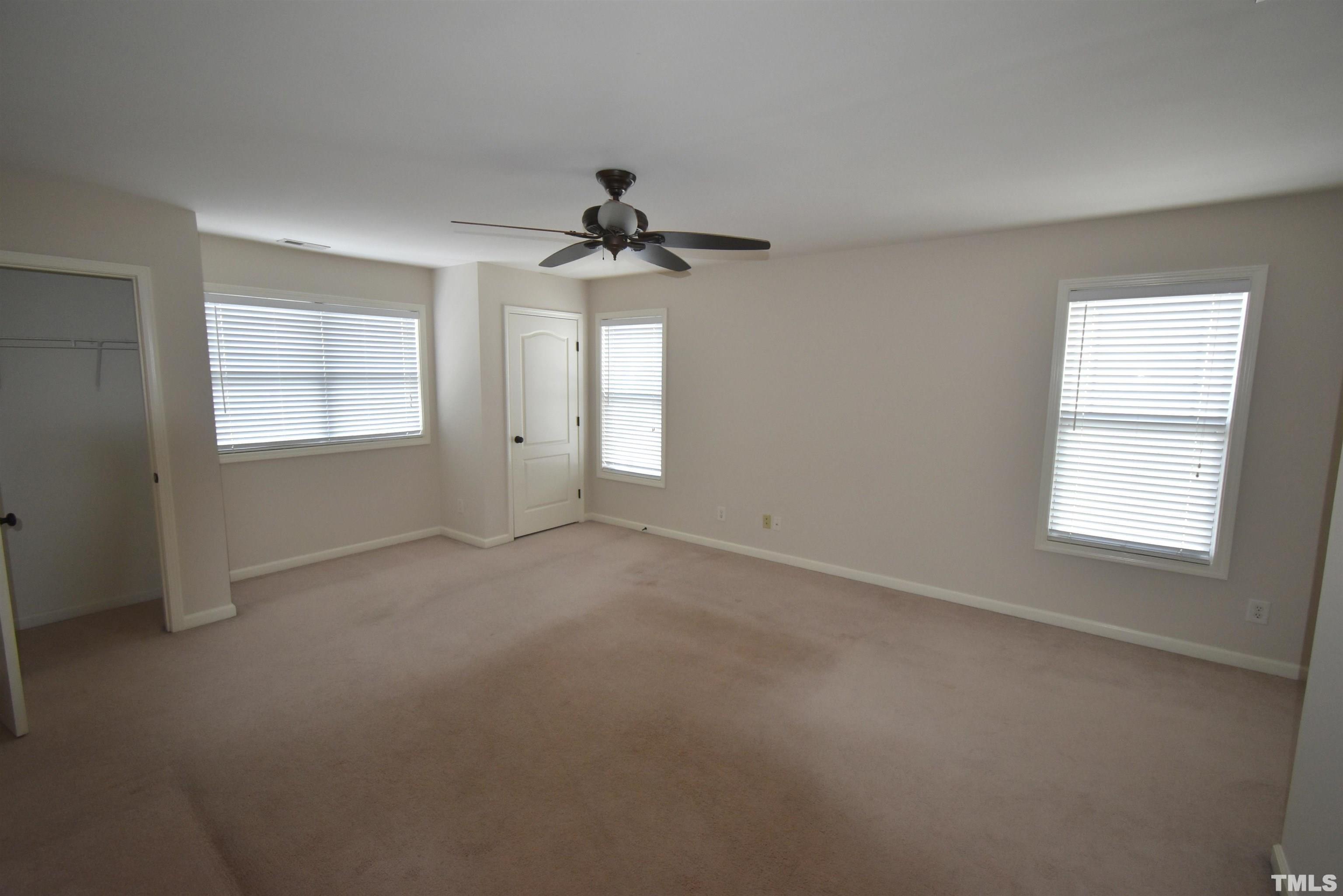 2019 Sinclair Trace Burlington, NC 27215 - Photo 17 of 32 a view of an empty room with a window