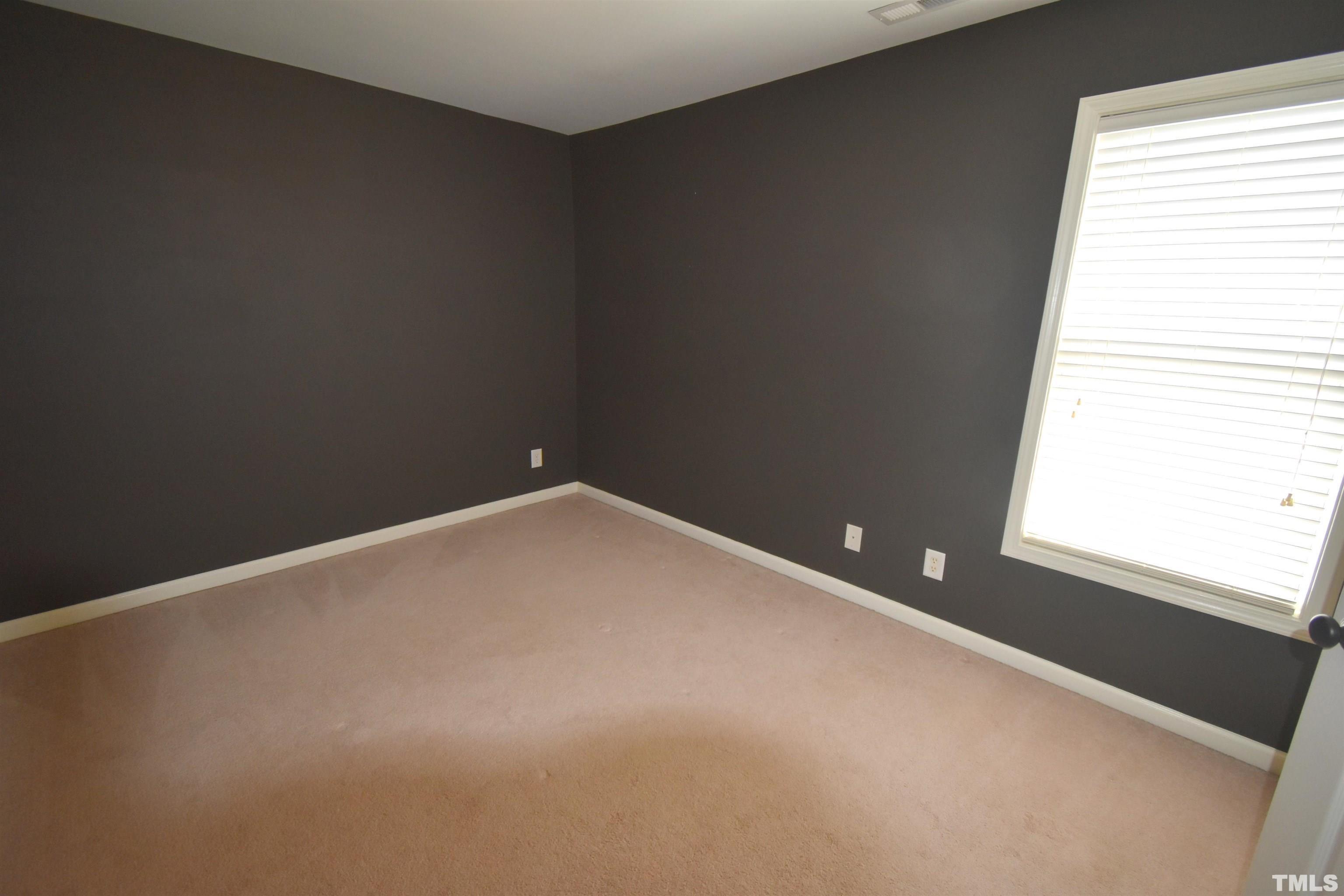 2019 Sinclair Trace Burlington, NC 27215 - Photo 22 of 32 an empty room with windows