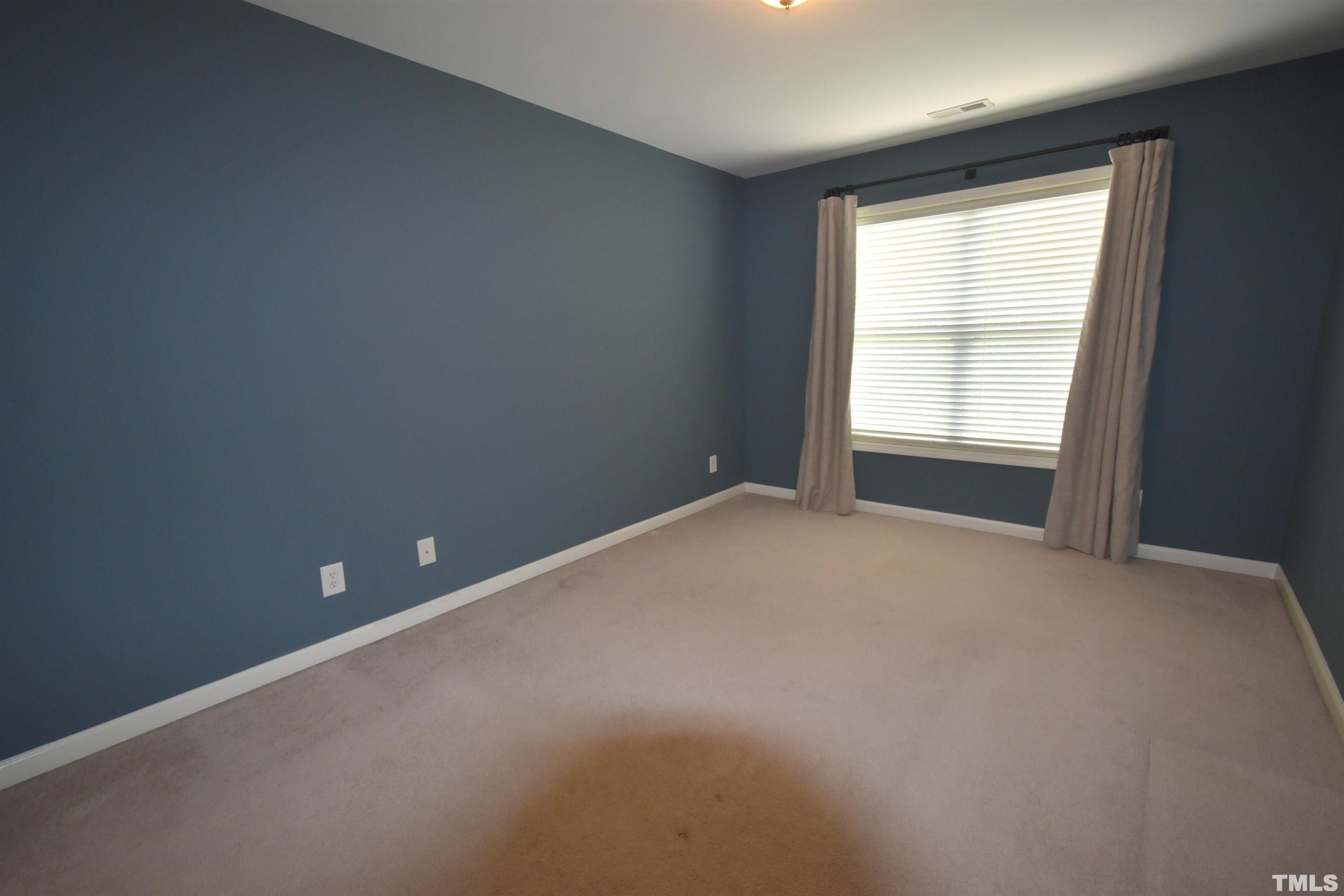 2019 Sinclair Trace Burlington, NC 27215 - Photo 23 of 32 an empty room with a window