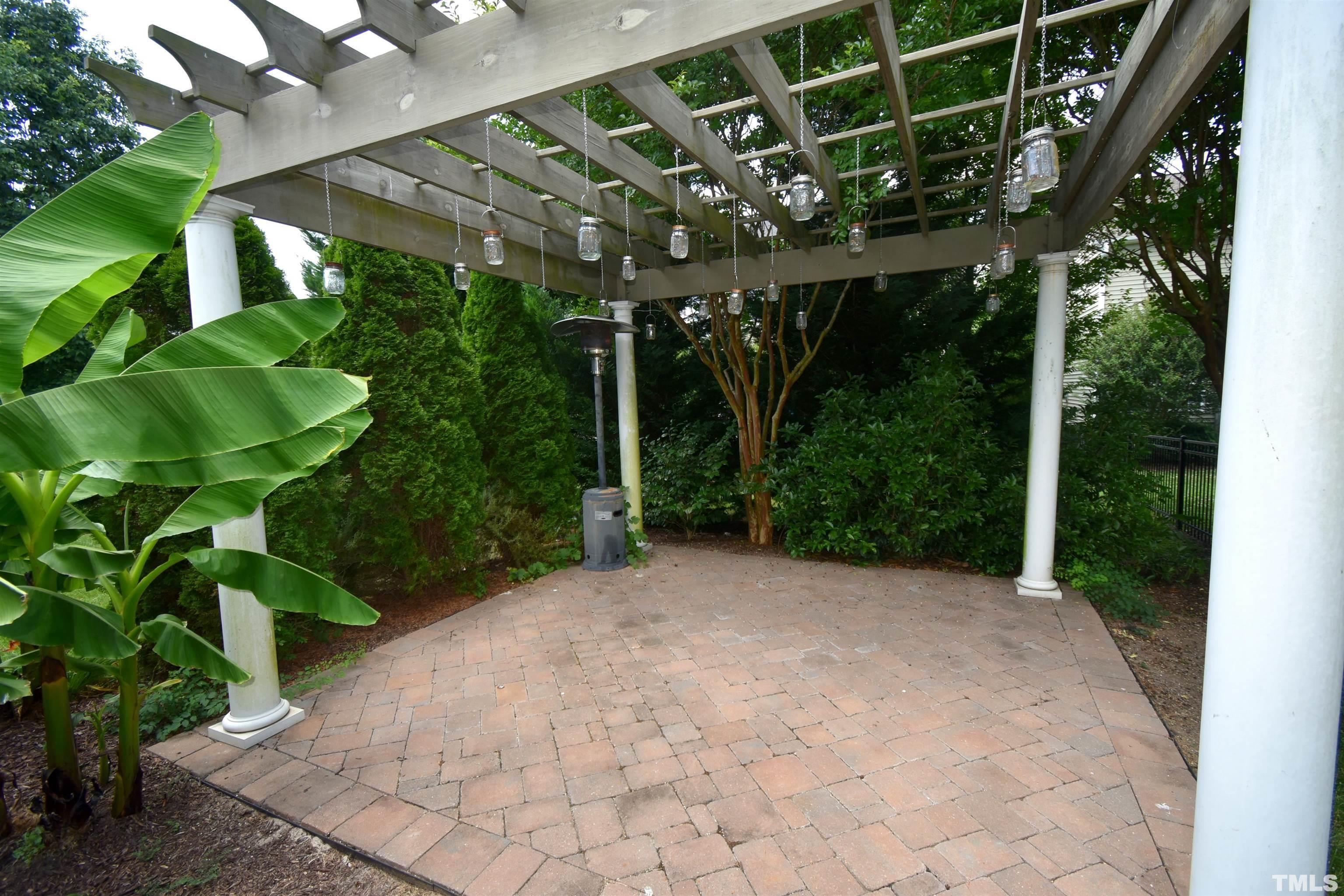 2019 Sinclair Trace Burlington, NC 27215 - Photo 27 of 32 a view of a backyard with plants