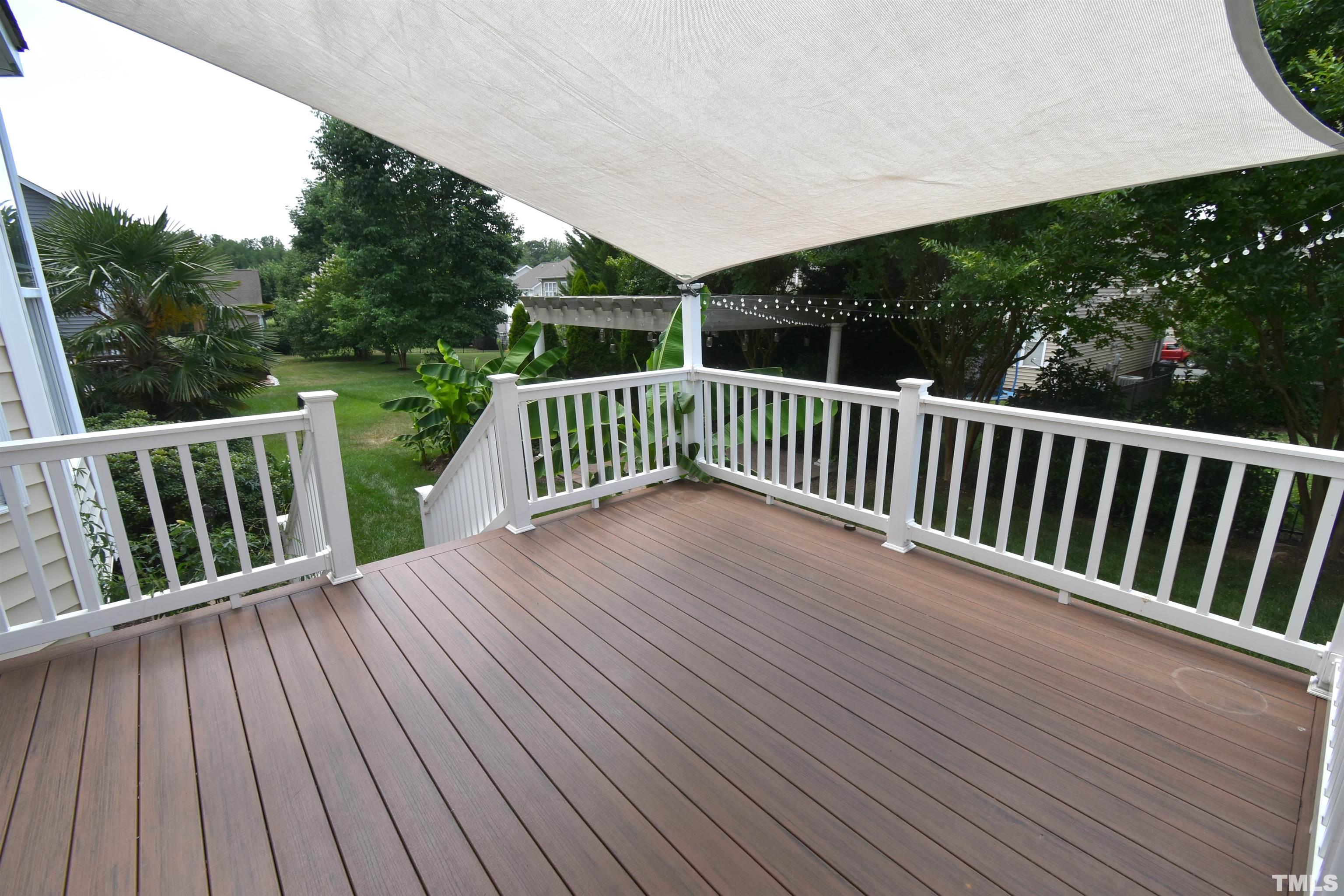 2019 Sinclair Trace Burlington, NC 27215 - Photo 29 of 32 a view of balcony with wooden floor and fence