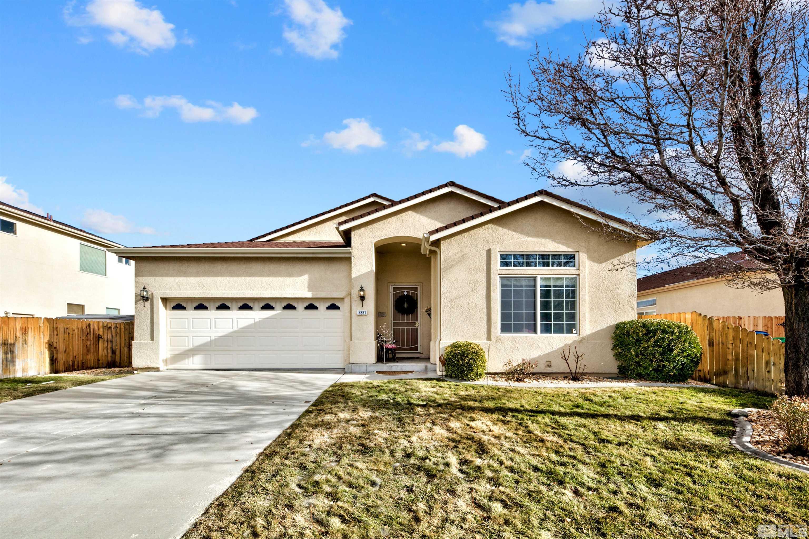 2831 Longridge Drive Carson City, NV 89706 - Photo 2 of 27 a view of a house with a yard
