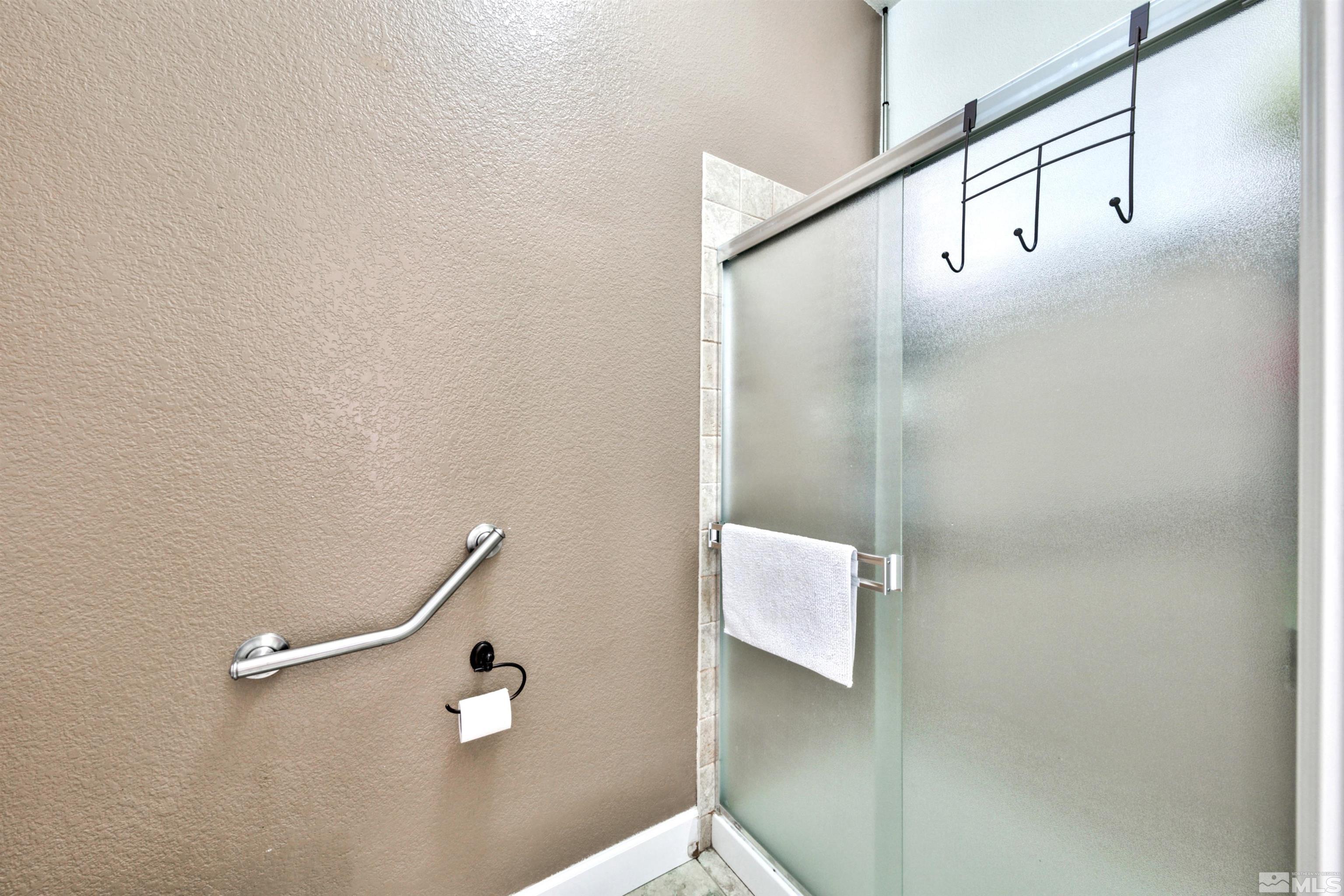 2831 Longridge Drive Carson City, NV 89706 - Photo 21 of 27 a bathroom with a shower