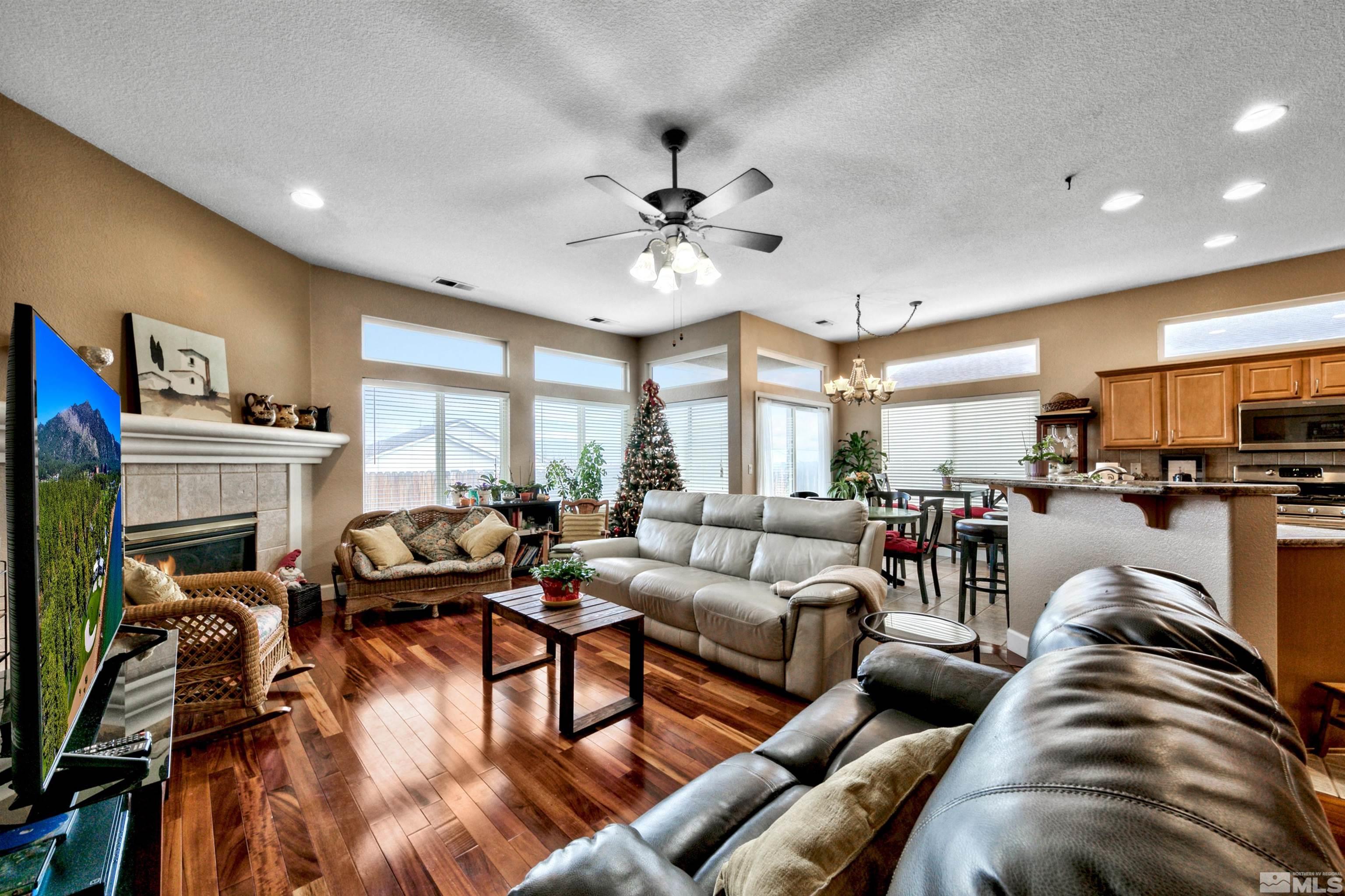 2831 Longridge Drive Carson City, NV 89706 - Photo 5 of 27 a living room with furniture fireplace and a view of kitchen