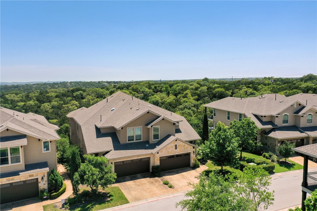 an aerial view of a house with a garden