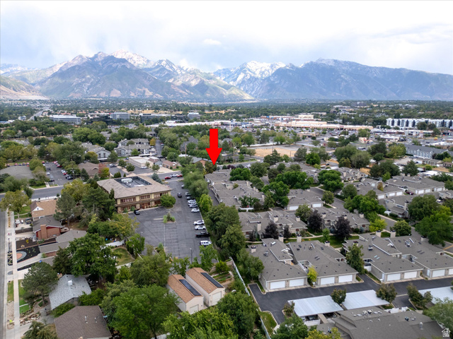 888 East 6895 South Midvale, UT 84047 - Photo 52 of 54 Scenic aerial capturing the home’s location with stunning mountain views in the distance, adding to the overall appeal of the area.