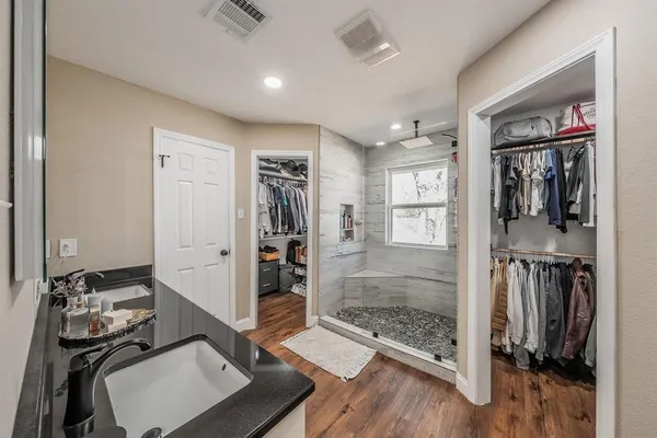 a view of a hallway with workspace