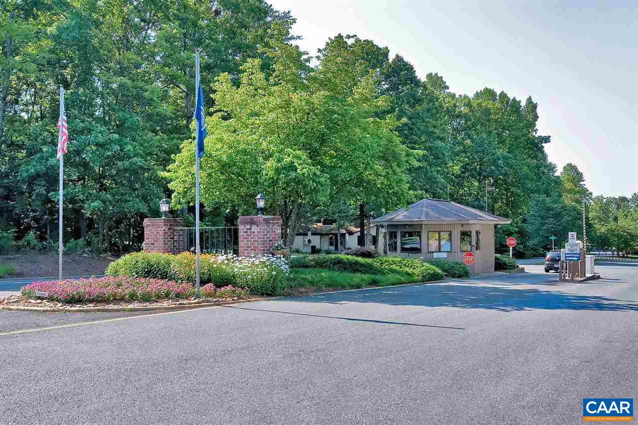 14 Haversack Road, Unit 310/5 Palmyra, VA 22963 - Photo 23 of 47 a front view of a house with a garden and plants