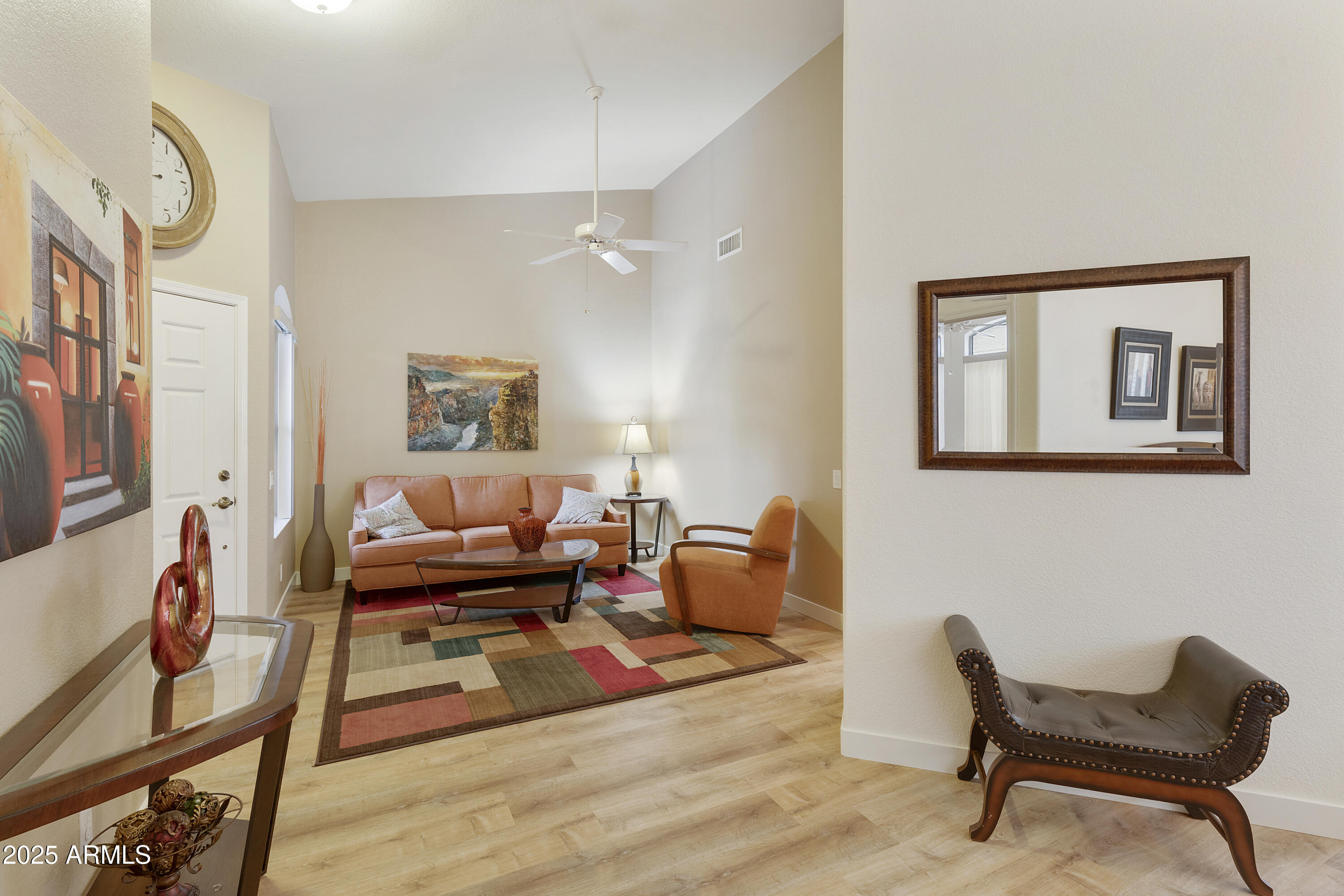 23745 South Vacation Way Sun Lakes, AZ 85248 - Photo 5 of 52 a living room with furniture