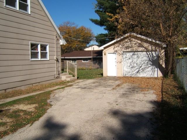3908 Louisiana Road Rockford, IL 61108 - Photo 4 of 22 a view of back yard of the house