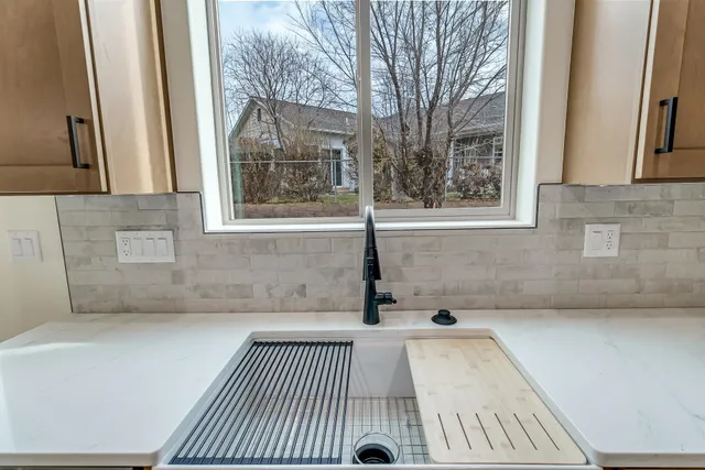 a bathroom with a bathtub and shower