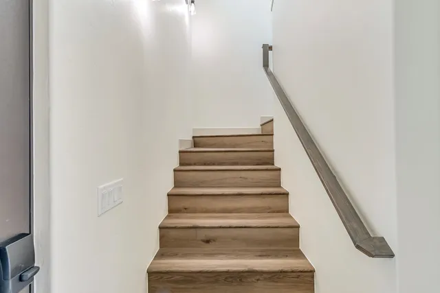 a view of a room that has a window in it