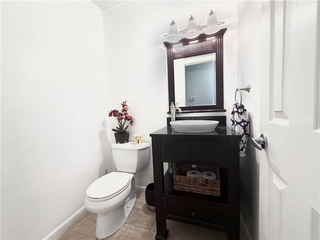 213 Manor View Drive Manor, PA 15665 - Photo 13 of 33 a bathroom with a toilet a sink and mirror