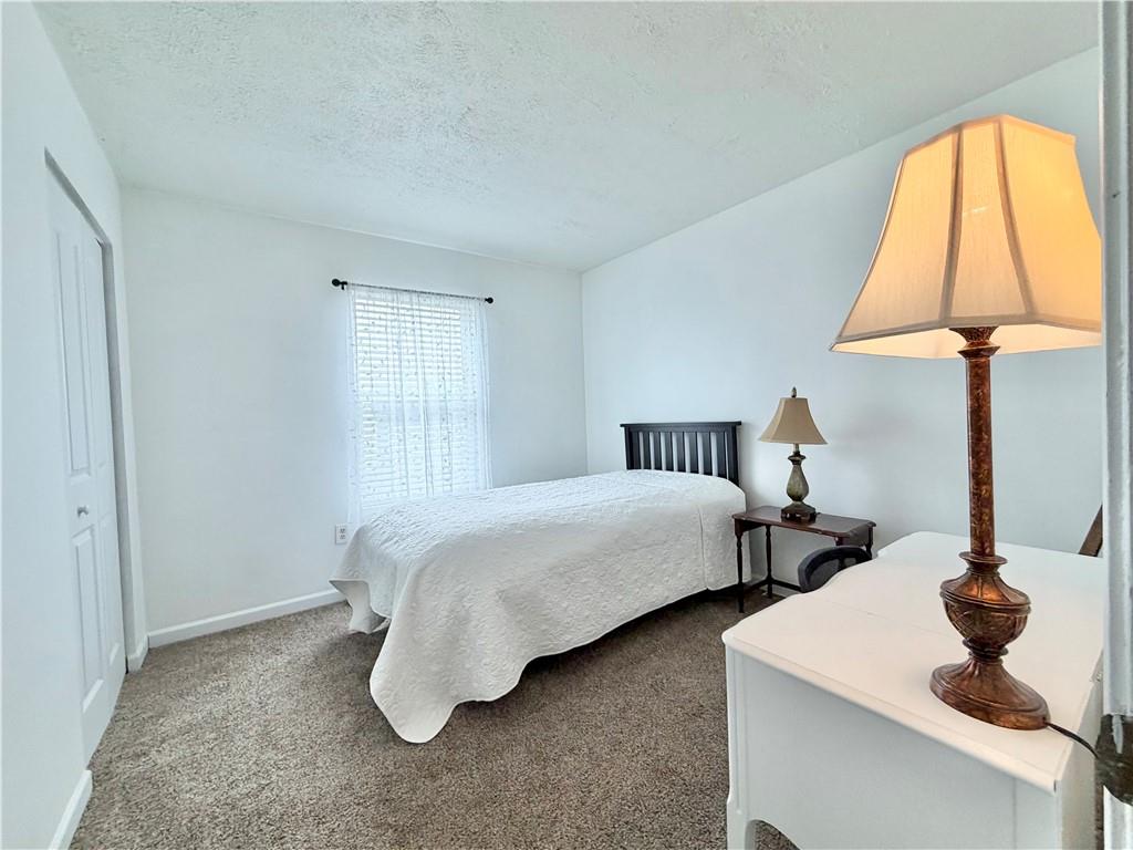 213 Manor View Drive Manor, PA 15665 - Photo 28 of 33 a bedroom with bed and a window