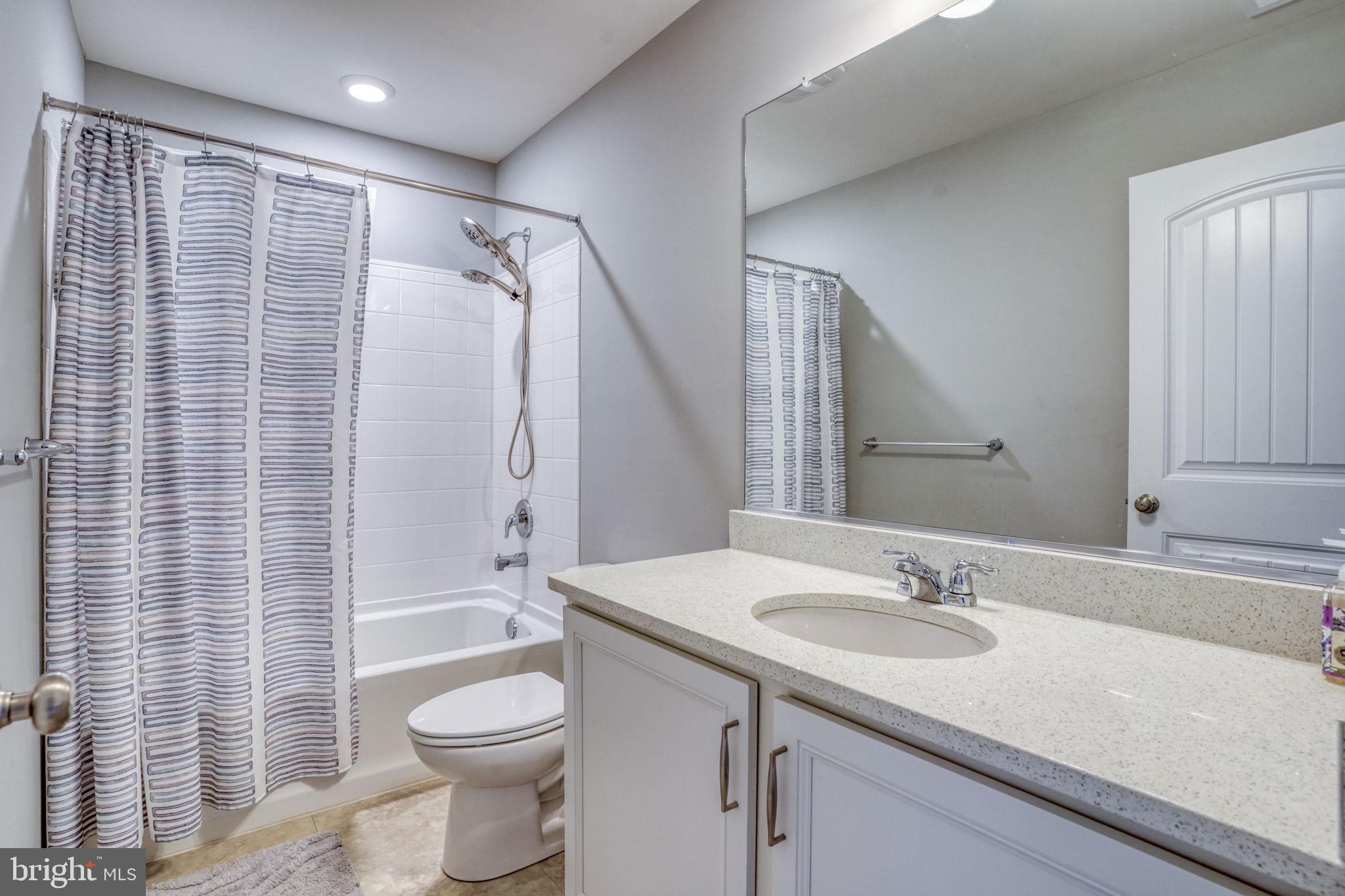 15272 Crape Myrtle Road Milton, DE 19968 - Photo 55 of 61 Modern bathroom with sleek finishes.