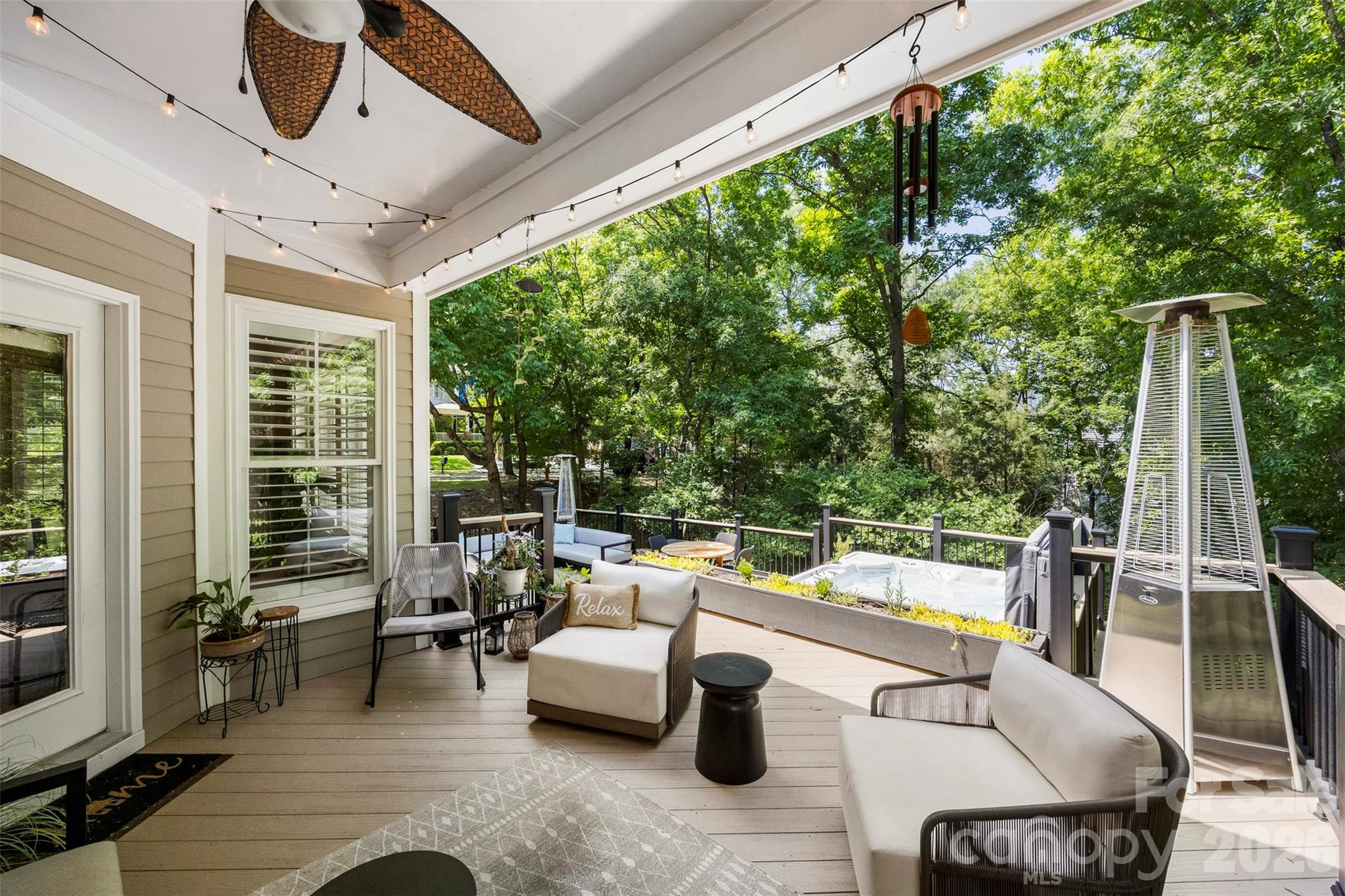 606 Andover Lane Tega Cay, SC 29708 - Photo 39 of 48 a outdoor space with patio the couch and glass door